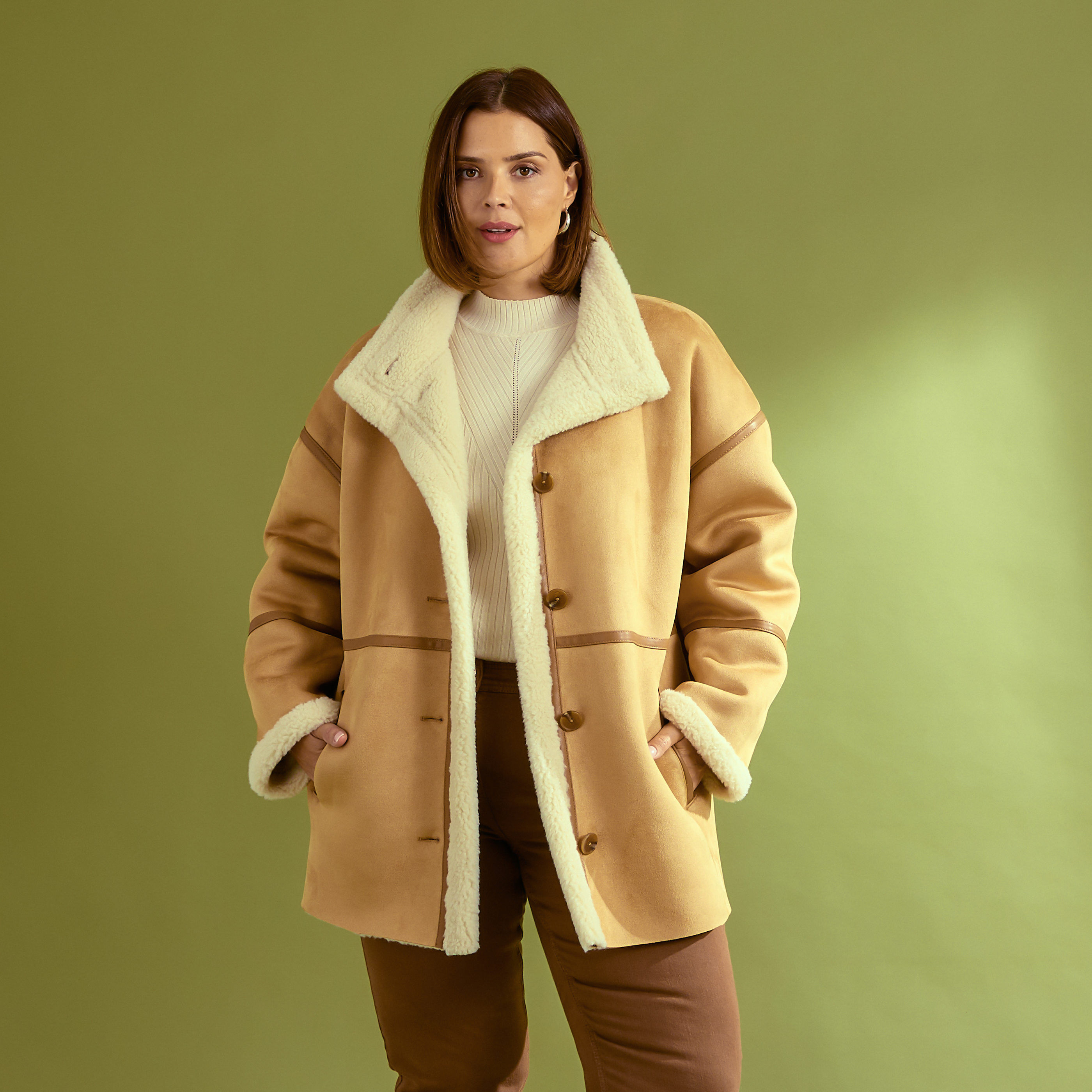 Manteau effet peau lain&eacute;e femme