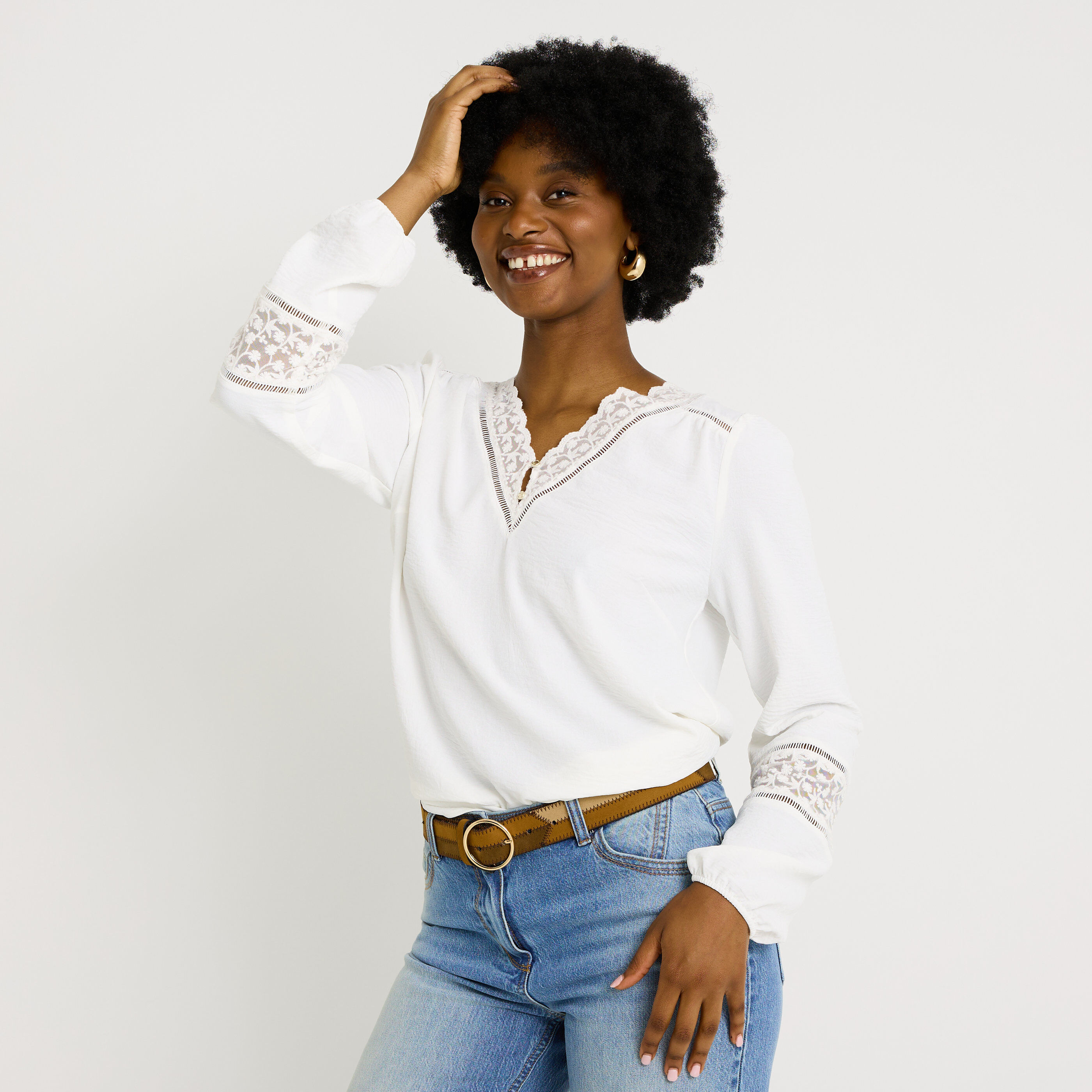 Blouse unie d&eacute;tails ajour&eacute;s femme