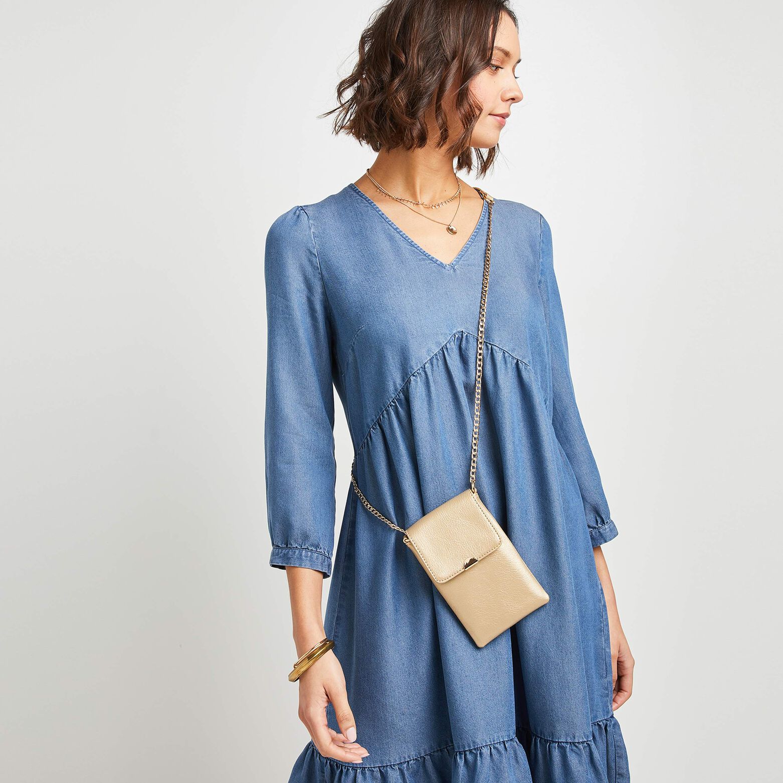 Pochette de téléphone dorée femme