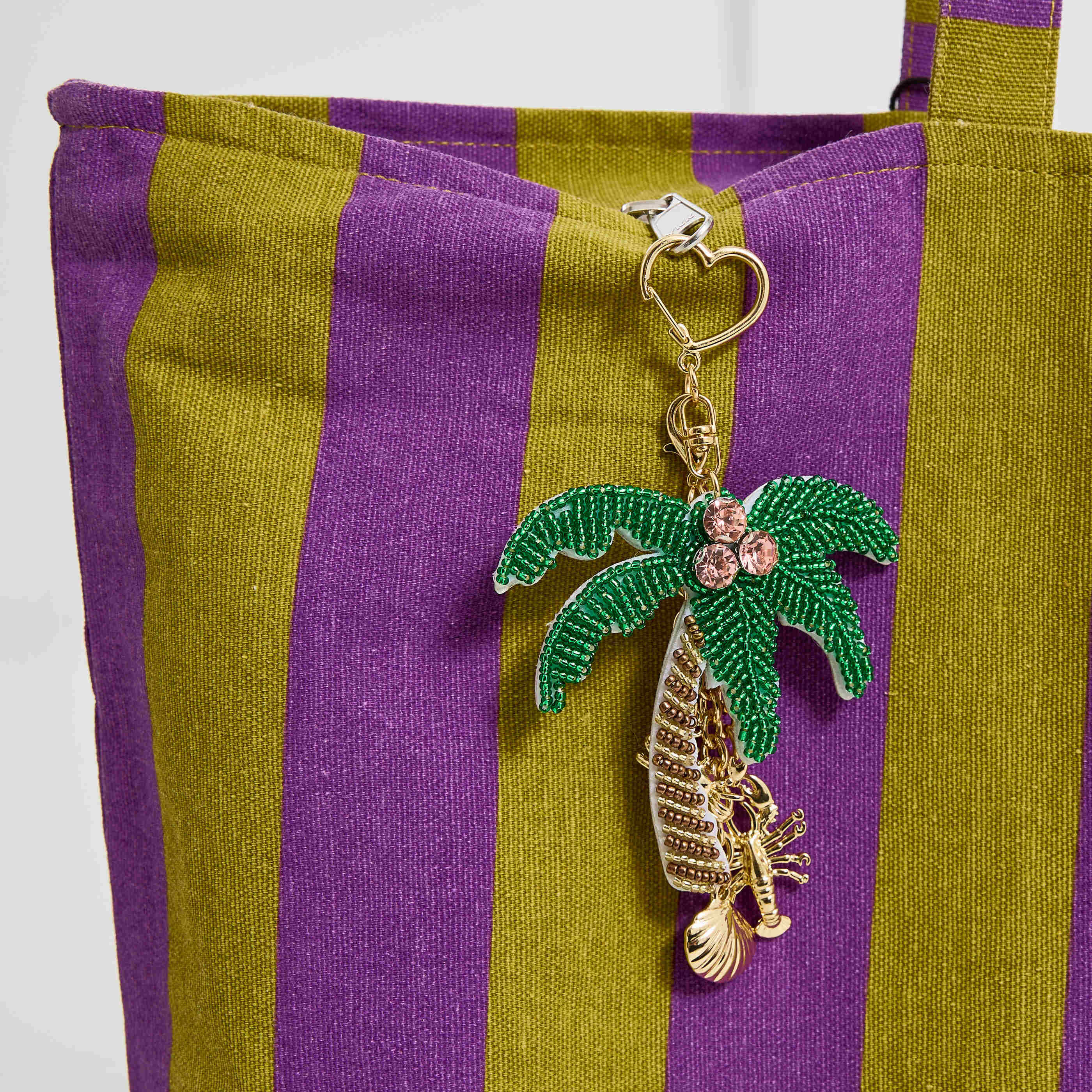 Porte-cl&eacute; palmier et breloques femme