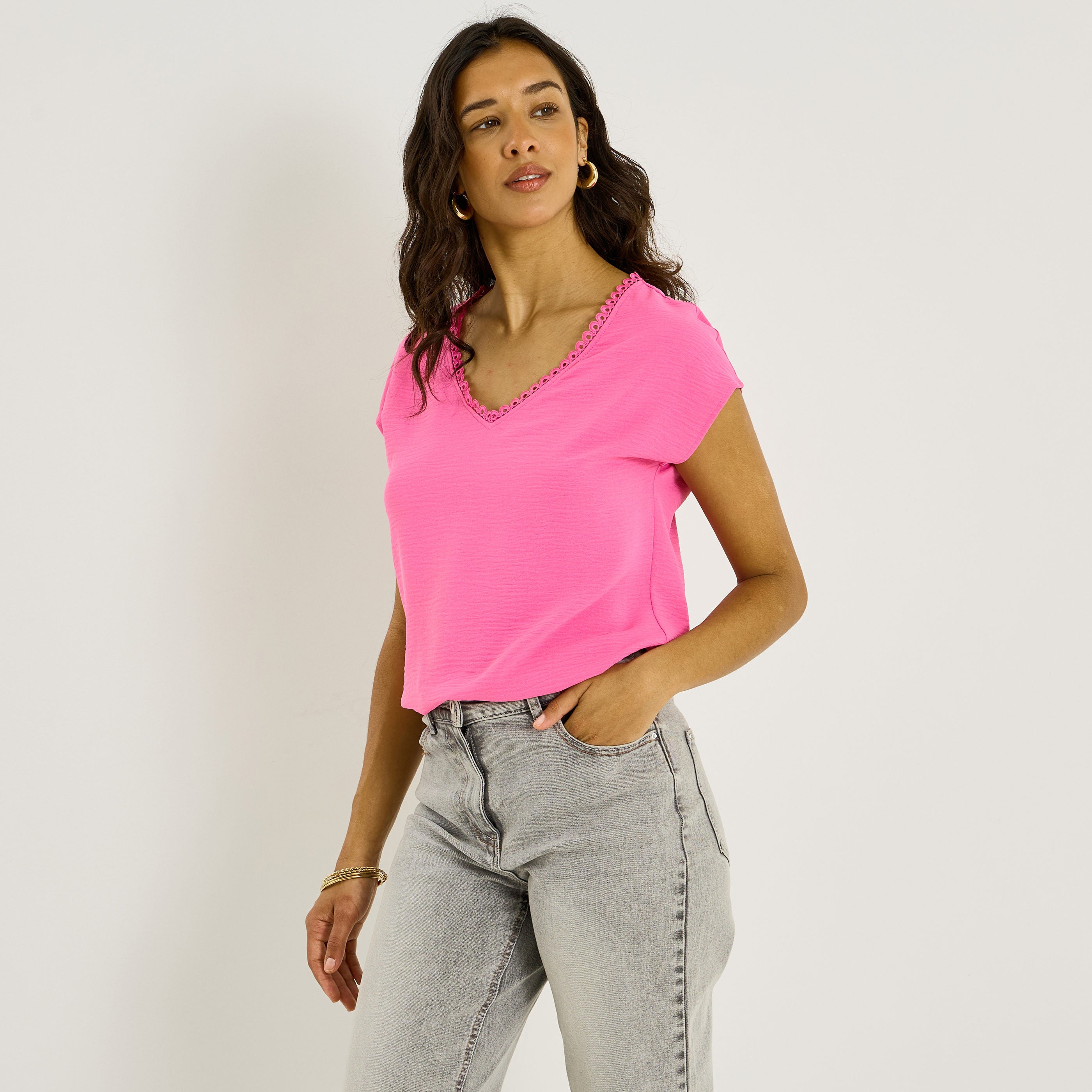 Blouse unie d&eacute;tails ajour&eacute;s femme